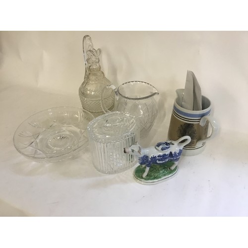 957 - A Three Ring Diamond Point Claret Jug, a Mocha ware Jug, a Cow Creamer & three items of Glass.