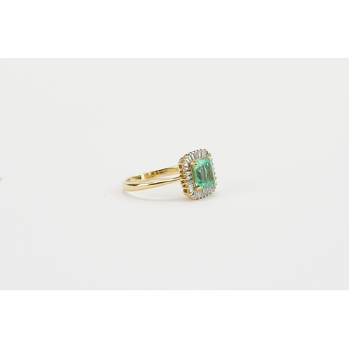 3 - A 18ct yellow gold diamond and emerald set ring, with baguette diamond surrounds. Approx 1.5ct emera... 