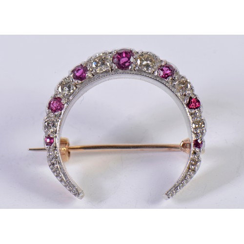 25 - A Ladies 9ct Gold & Faced Ruby & Diamond Crescent Brooch.