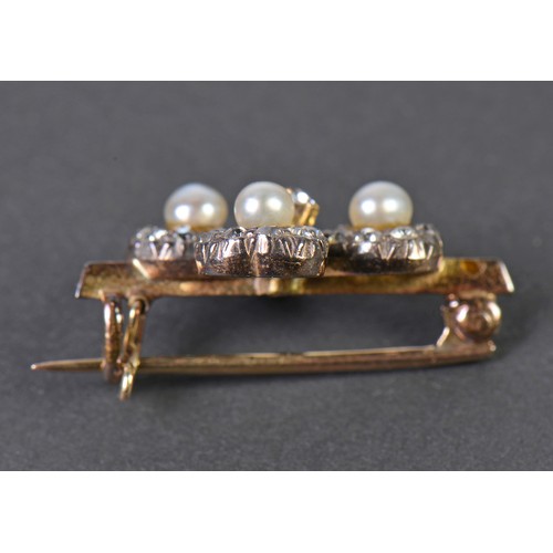 26 - A Ladies Silver Faced & Diamond & Pearl mounted Shamrock Brooch.