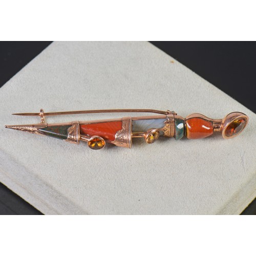 31 - A 9ct Rose Gold Scottish made Dirk Brooch in an engraved mount set with Jasper & Carnelian.