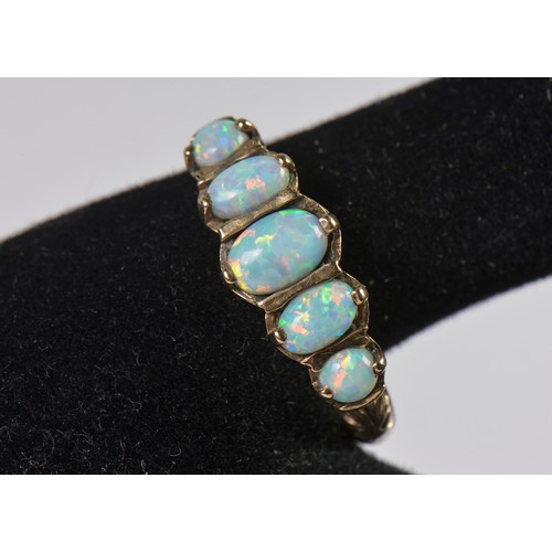 39 - A Ladies Victorian design 9ct Gold Opal Ring in a Cage & Claw setting. Size: Q/R. Weighing: 4.1 gram... 