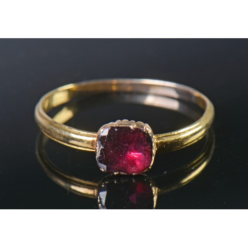 47 - A Georgian Garnet Ring with a Fold over setting. Size: R. Weighing: 1.6 grams.