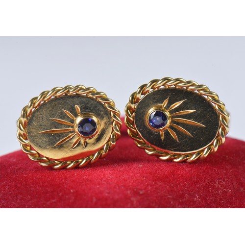 49 - A Heavy Pair of Gentleman's 18ct Gold Cufflinks each set with a Sapphire. Weighing: 14.5 grams.