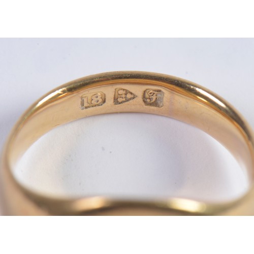 53 - A Gentleman's 18ct Gold Signet Ring. Size: K. Weighing 9.4 grams.