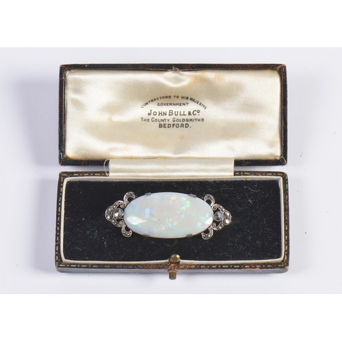 54 - A Marquisette & Opal Dress Brooch contained in a 