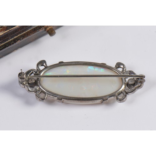 54 - A Marquisette & Opal Dress Brooch contained in a 