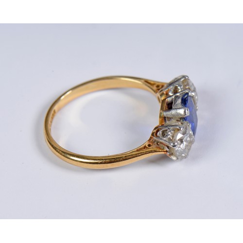 58 - A Ladies 18ct Gold & Platinum Pale Blue Cushion cut Sapphire Ring set with two Diamonds. Size: L. We... 