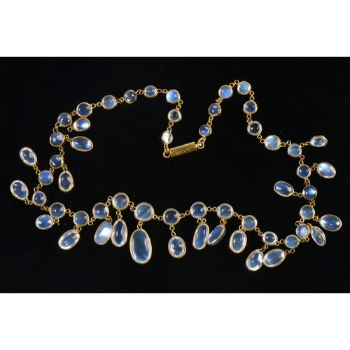 59 - An Arts & Crafts design Multi fringed tasseled Moonstone Necklace with clasp.