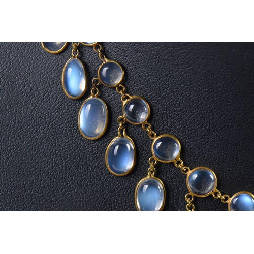 59 - An Arts & Crafts design Multi fringed tasseled Moonstone Necklace with clasp.