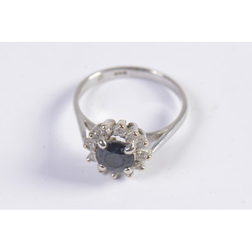 60 - A Ladies Sapphire & chip mounted Platinum set Dress Ring. Size: N. Weighing: 4.5 grams.