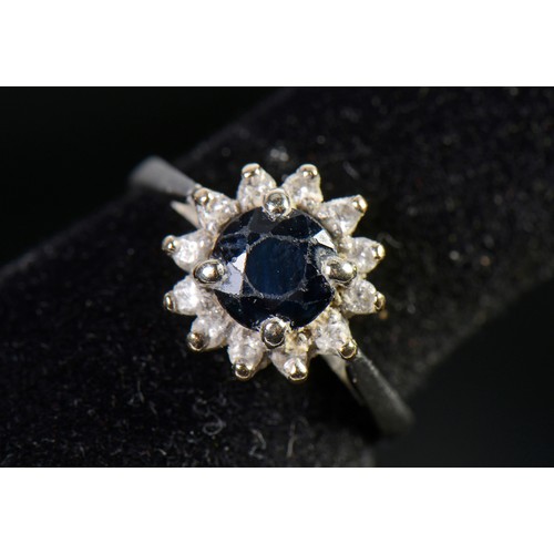 60 - A Ladies Sapphire & chip mounted Platinum set Dress Ring. Size: N. Weighing: 4.5 grams.