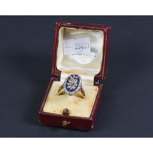 62 - A Regency design Blue enamelled Gold Diamond mounted Floriette design Ring sitting on an open cage w... 