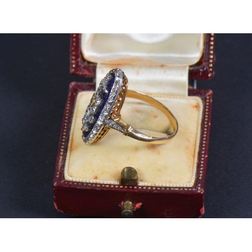 62 - A Regency design Blue enamelled Gold Diamond mounted Floriette design Ring sitting on an open cage w... 