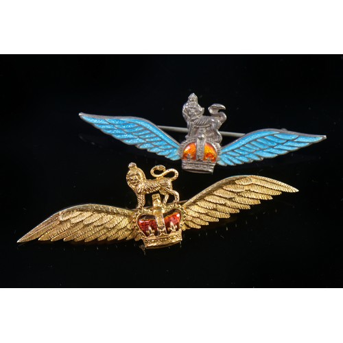 63 - A 9ct Gold Regimental Brooch with a Lion Gardant, Red enamelled Crown & Wings of Victory. Weighing: ... 