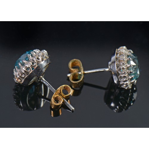 65 - A Pair of Pale Blue/Green Zircon & Diamond mounted Earrings in a Mappin & Webb Box.