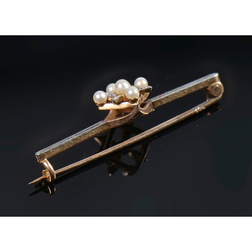 66 - A 15ct Gold & Platinum faced Diamond & Pearl Leaf Brooch. Weighing: 2 Grams.