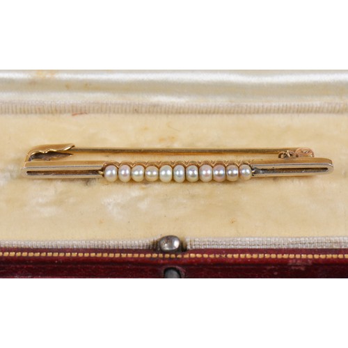 67 - A Vintage Gold & Platinum faced Pearl Line Brooch contained in an Original Box. Weighing: 3.8grams.