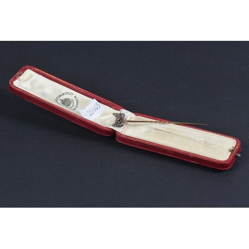 71 - A Fox Head Diamond Set Stick Pin with Ruby Eyes contained in the Original Box.