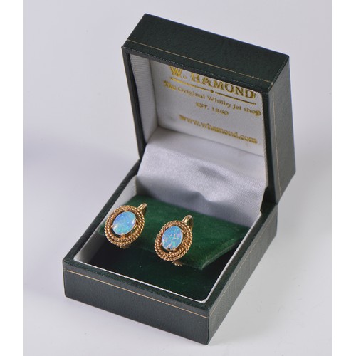 84 - A Pair of 14ct Gold Screw-on Opal Doublet Earrings. Weighing: 4 Grams.