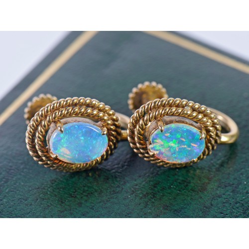 84 - A Pair of 14ct Gold Screw-on Opal Doublet Earrings. Weighing: 4 Grams.