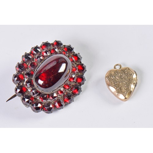 94 - A Czechoslovakian Garnet Set Brooch & a Turquoise set Locket.