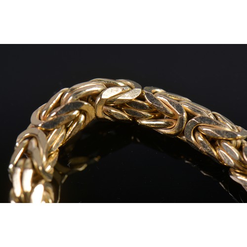 98 - A 9ct Gold Byzantine Bracelet. Weighing: 26 grams.