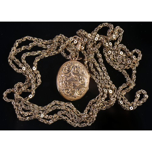 105 - A Long Link Muff Chain with a 9ct Gold Clasp in a Circle, Star & Rib pattern. Measuring: 148cms. Wei... 