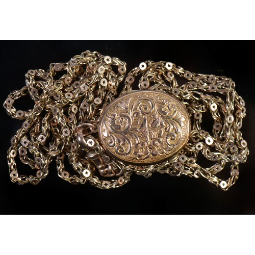 105 - A Long Link Muff Chain with a 9ct Gold Clasp in a Circle, Star & Rib pattern. Measuring: 148cms. Wei... 