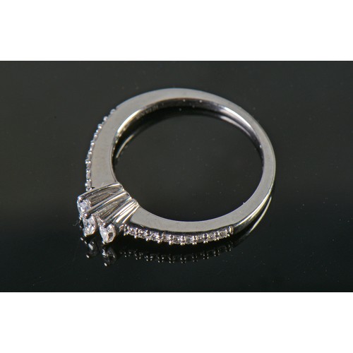 113 - An 18ct White Gold Diamond Ring set with Marquise Diamonds. Size: O. Weighing: 3.6 grams.