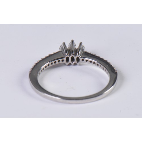 113 - An 18ct White Gold Diamond Ring set with Marquise Diamonds. Size: O. Weighing: 3.6 grams.