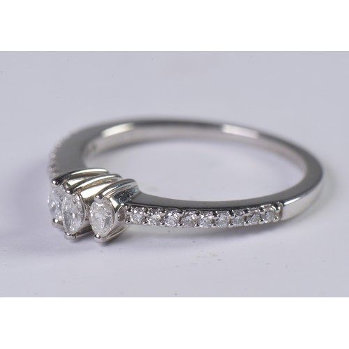 113 - An 18ct White Gold Diamond Ring set with Marquise Diamonds. Size: O. Weighing: 3.6 grams.