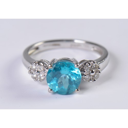 114 - An 18ct White Gold Ring set with an Apatite of 2.5cts. Size: O. Weighing: 4 grams.