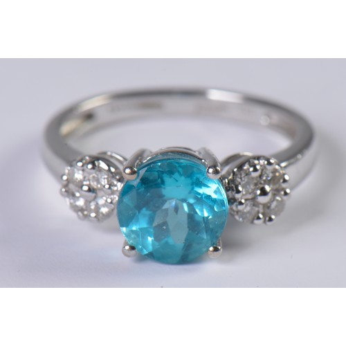 114 - An 18ct White Gold Ring set with an Apatite of 2.5cts. Size: O. Weighing: 4 grams.