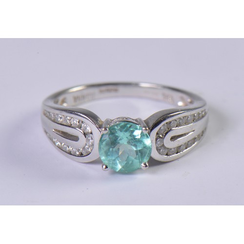 115 - An 18ct White Gold Diamond Set Paraiba Tourmaline weighing 1.25cts. Size: O Weighing: 5.43 grams.