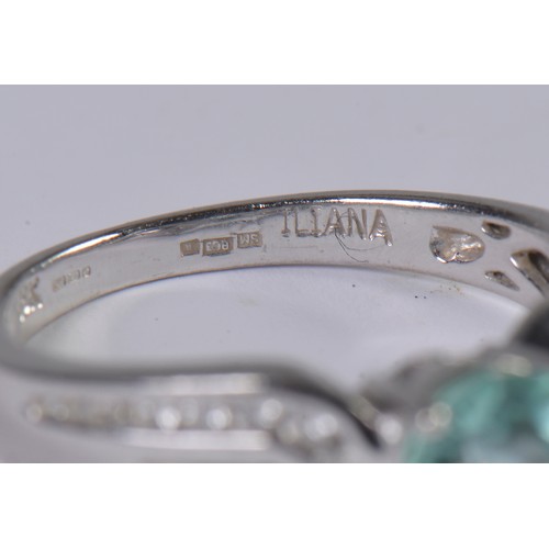 115 - An 18ct White Gold Diamond Set Paraiba Tourmaline weighing 1.25cts. Size: O Weighing: 5.43 grams.