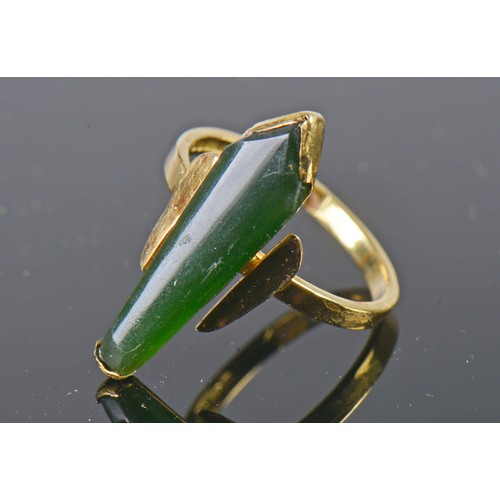 126 - A Modernistic Jade Set 18ct Gold Ring. Size: P. Weighing: 4 grams.