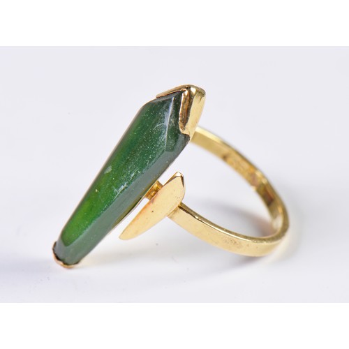 126 - A Modernistic Jade Set 18ct Gold Ring. Size: P. Weighing: 4 grams.