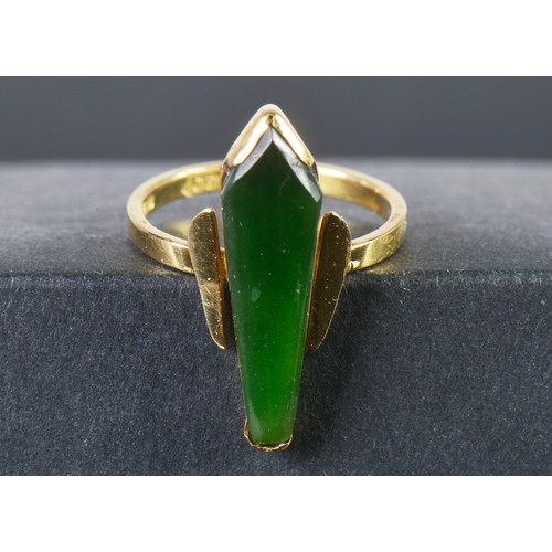 126 - A Modernistic Jade Set 18ct Gold Ring. Size: P. Weighing: 4 grams.