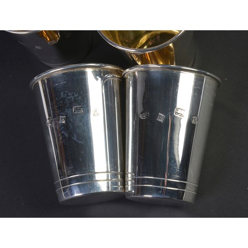 183 - A Set of Four Silver Tot Cups, Birmingham Hallmark. Weighing: 162 grams.