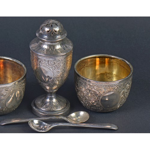 192 - A Three Piece Silver engraved Cruet Set in Case consisting of a Georgian Bun Top Castor, Two Small B... 