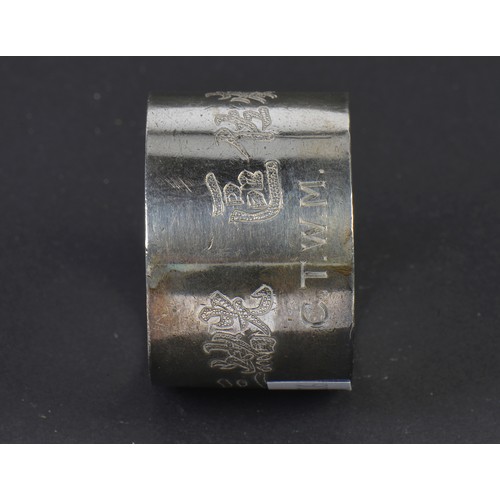 194 - A Heavy Chinese Silver Happy Verse Napkin Ring with Character Hallmarks. Weighing: 57 grams.