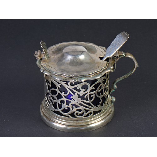 196 - A Silver pierced & Floral Mustard Pot with lid. Weighing: 121 grams. Sheffield N. Maker: Atkins Bros... 