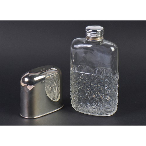 217 - A Silver Plated Hip Flask with Cut Glass & mount.