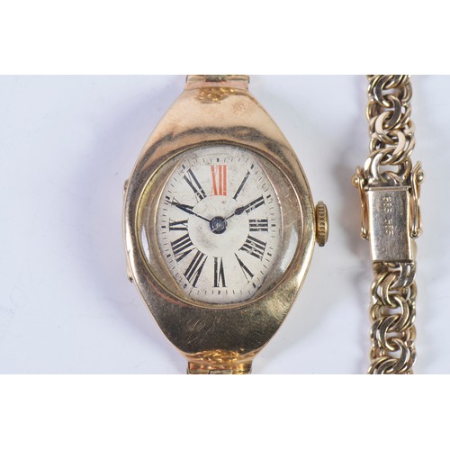 227 - A Vintage 9ct Gold Ladies Wristwatch with a Roman Numeral Face & comes on a 14ct Gold Strap. Total W... 