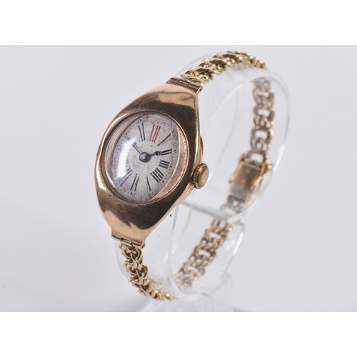 227 - A Vintage 9ct Gold Ladies Wristwatch with a Roman Numeral Face & comes on a 14ct Gold Strap. Total W... 