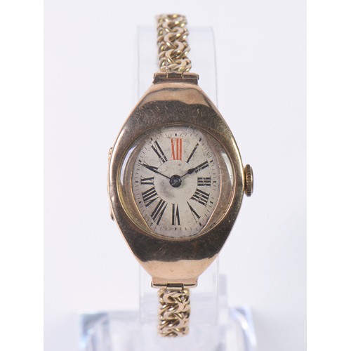 227 - A Vintage 9ct Gold Ladies Wristwatch with a Roman Numeral Face & comes on a 14ct Gold Strap. Total W... 