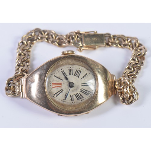 227 - A Vintage 9ct Gold Ladies Wristwatch with a Roman Numeral Face & comes on a 14ct Gold Strap. Total W... 