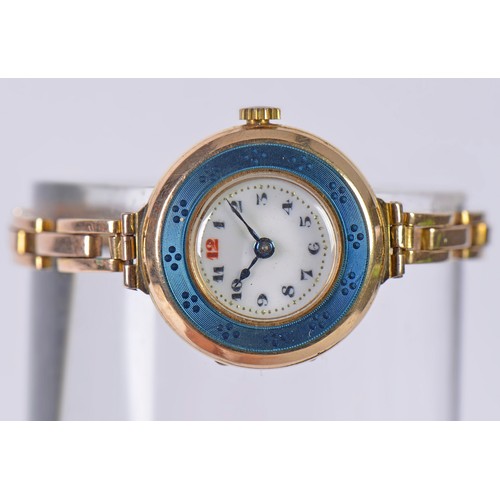 228 - A Vintage 15ct Gold Ladies Wristwatch with an Enamel Face & comes on a 15ct Gold Strap. Weighing: 23... 