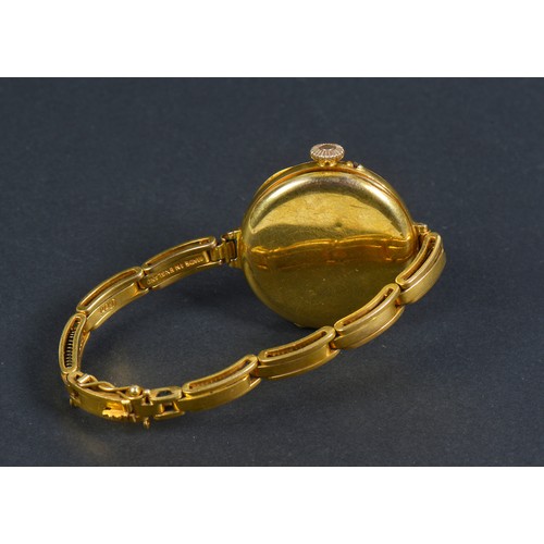 233 - A Ladies 9ct Gold Cased Nurse's Watch with an enamel face with extending bracelet. Weighing: 21 gram... 